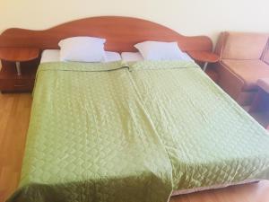 Postel nebo postele na pokoji v ubytování Hotel Elmaz