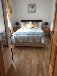 Ліжко або ліжка в номері Padua Guest Accommodation Rosslare