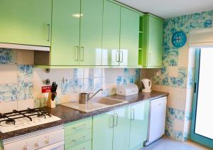 A kitchen or kitchenette at Algarve Sweet Home - Marina Front