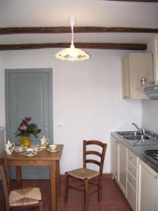 A kitchen or kitchenette at Rimaggiori Country Home & Restaurant