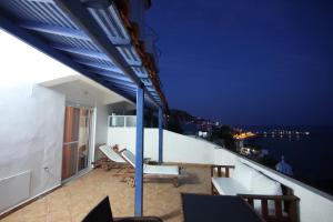 A balcony or terrace at Irini Plomariou Apartments
