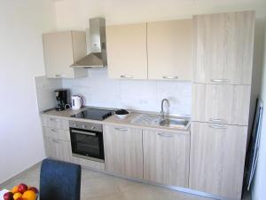Kuchyňa alebo kuchynka v ubytovaní Apartman Danijel