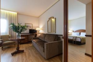 Postel nebo postele na pokoji v ubytování Hotel Exe Reina Isabel