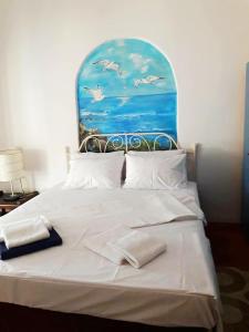 Posteľ alebo postele v izbe v ubytovaní Apollonion Apartment Aigina