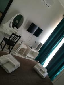 TV a/nebo společenská místnost v ubytování Guest House Domus Cicerone