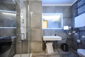 Koupelna v ubytování Bellini Relais + 37 fotografií