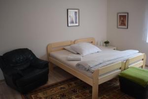 Postel nebo postele na pokoji v ubytování Apartmány Lípa