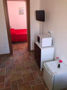 Postel nebo postele na pokoji v ubytování Cala San Francesco B&B