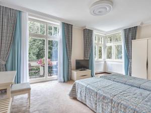 Postel nebo postele na pokoji v ubytování Apartment Villa Dionysus