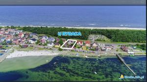 an aerial view of a resort near the ocean at Kwatery u Rybaka in Kuźnica
