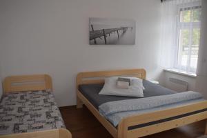 Postel nebo postele na pokoji v ubytování Apartmány Lípa