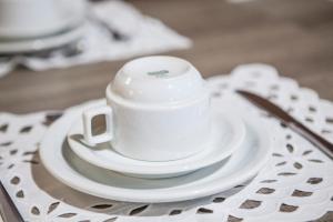 Comodidades para preparar café e chá em Pousada Sol e Mar