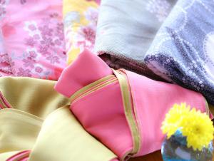 a pink diaper bag with a yellow flower on it at Yoshinotei in Iida