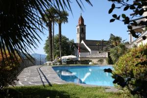 Het zwembad bij of vlak bij Hotel Ronco