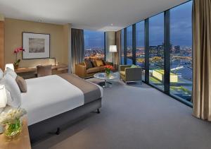 
a hotel room with a view of the ocean at Crown Promenade Melbourne in Melbourne
