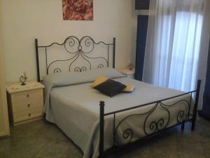Postel nebo postele na pokoji v ubytování B&B Casa Dei Mille