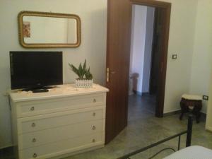TV a/nebo společenská místnost v ubytování B&B Casa Dei Mille