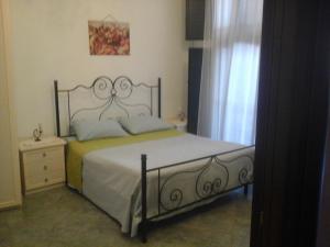 Postel nebo postele na pokoji v ubytování B&B Casa Dei Mille