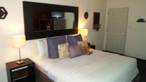 Кровать или кровати в номере Paradice Motel