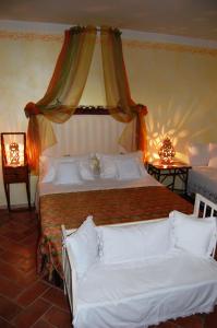 Posteľ alebo postele v izbe v ubytovaní B&B Vento di Rose