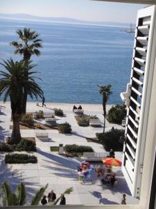 a view of the ocean from a building at B&B Central Palace Heritage in Split
