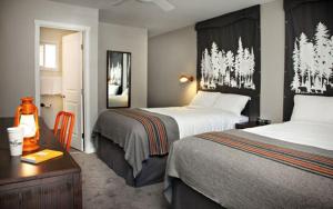 Letto o letti in una camera di Basecamp Tahoe South