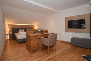 Telewizja i/lub zestaw kina domowego w obiekcie Hotel Unterhof
