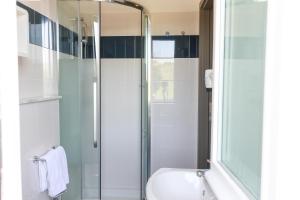 Koupelna v ubytování Hotel Olympia