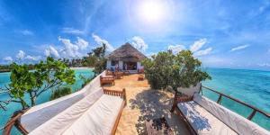 a resort in the middle of the ocean at Baraka Beach Bungalows in Nungwi