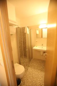 Koupelna v ubytování Aria Doria Otel