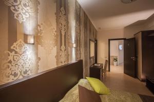 Ένα ή περισσότερα κρεβάτια σε δωμάτιο στο Rome Kings Suite +77 φωτογραφίες