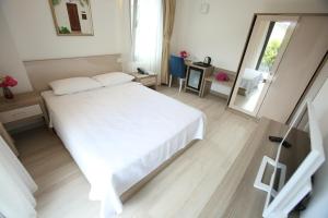 Postel nebo postele na pokoji v ubytování Aria Doria Otel