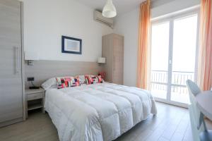 Postel nebo postele na pokoji v ubytování Hotel Olympia