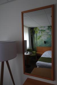 Postel nebo postele na pokoji v ubytování HCR Prinsen