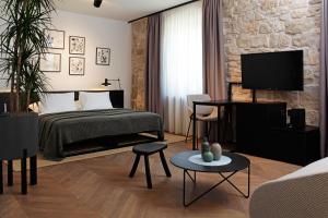 Boutique rooms Kastel Ismaeli客房内的一张或多张床位