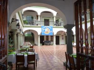 En restaurang eller annat matställe på Hotel Monte Alban - Solo Adultos