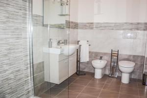 Koupelna v ubytování Un posto al sole + 46 fotografií