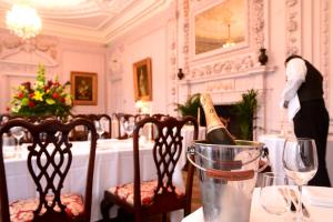 A restaurant or other place to eat at Stapleford Park Luxury Hotel 