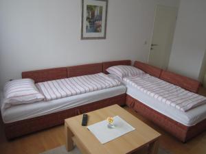 Postel nebo postele na pokoji v ubytování Apartman TIM