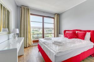 Posteľ alebo postele v izbe v ubytovaní GRANO APARTMENTS Gdańsk Motława SPA & Wellness