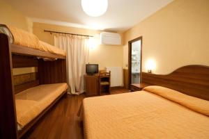 Postel nebo postele na pokoji v ubytování Hostaria da Lino + 14 fotografií