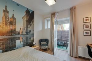 Posteľ alebo postele v izbe v ubytovaní Krakow For You Budget Apartments