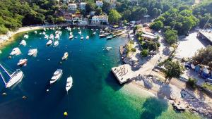 an aerial view of a harbor with boats in the water at Studio Apartman Marti in Kostrena +14 photos