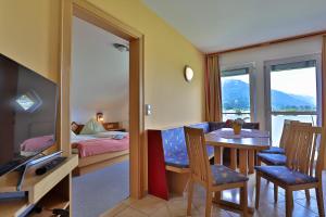 TV a/nebo společenská místnost v ubytování Hotel Garni Zerza
