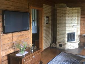 TV a/nebo společenská místnost v ubytování Künda Holiday Home