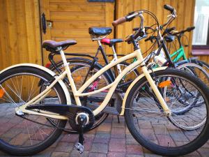 a group of bikes parked next to a building at Amrai in Ventspils