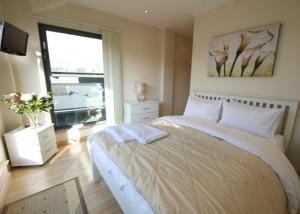 Postel nebo postele na pokoji v ubytování Dreamhouse Apartments Manchester City Centre