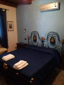 Posteľ alebo postele v izbe v ubytovaní B&B funtanadetalia