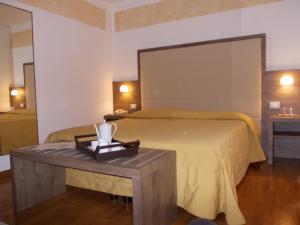Posteľ alebo postele v izbe v ubytovaní Hotel Miramonti