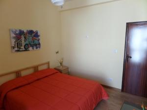 A bed or beds in a room at Casa Ferrara